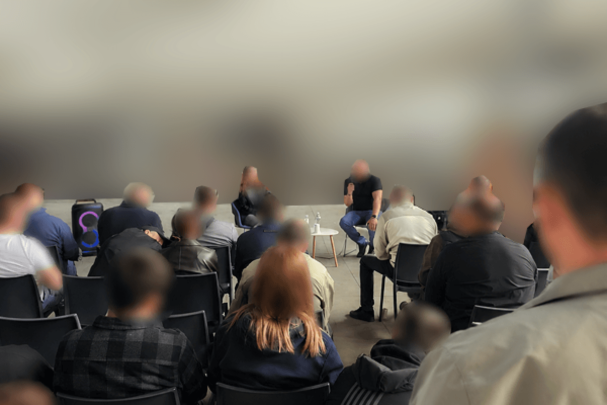 Audience at defense-tech presentation